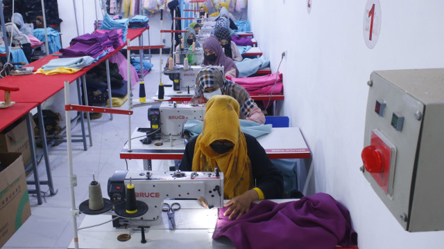 Afghan women work at a garments factory in Mazar-e-Sharif, Afghanistan, 05 September 2023